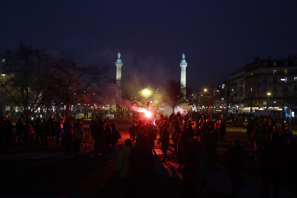 Protestors gather at Place de la Nation to end a demonstration against pension changes, Thursday, Jan. 19, 2023 in Paris. Hundreds of thousands protested on the streets of Paris and other French cities Thursday amid nationwide strikes against plans to raise the retirement age, but President Emmanuel Macron insisted he would press ahead with the proposed pension reforms. (AP Photo/Lewis Joly)