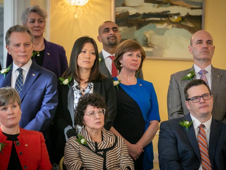 Minister of Emergency Management and Climate Readiness, Bowinn Ma is pictured in the middle row, second from left, at the swearing-in of cabinet on Dec. 7. (Mike McArthur/CBC - image credit)