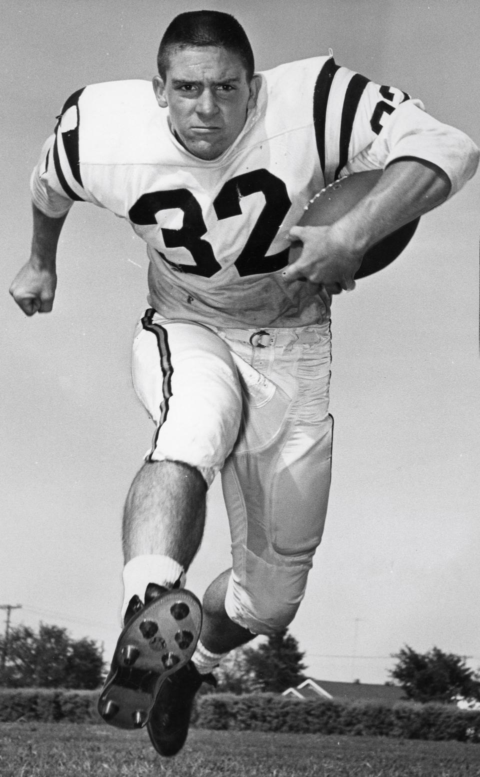 Former Oklahoma State running back Walt Garrison is pictured in this file photo from his time at OSU. Garrison died Wednesday at the age of 79.