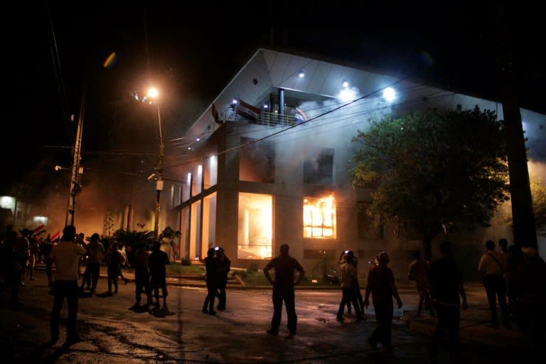 Paraguayan protesters broke into the Congress ransacking lawmakers' offices and starting fires after senators approved a proposal to allow the president to run for reelection