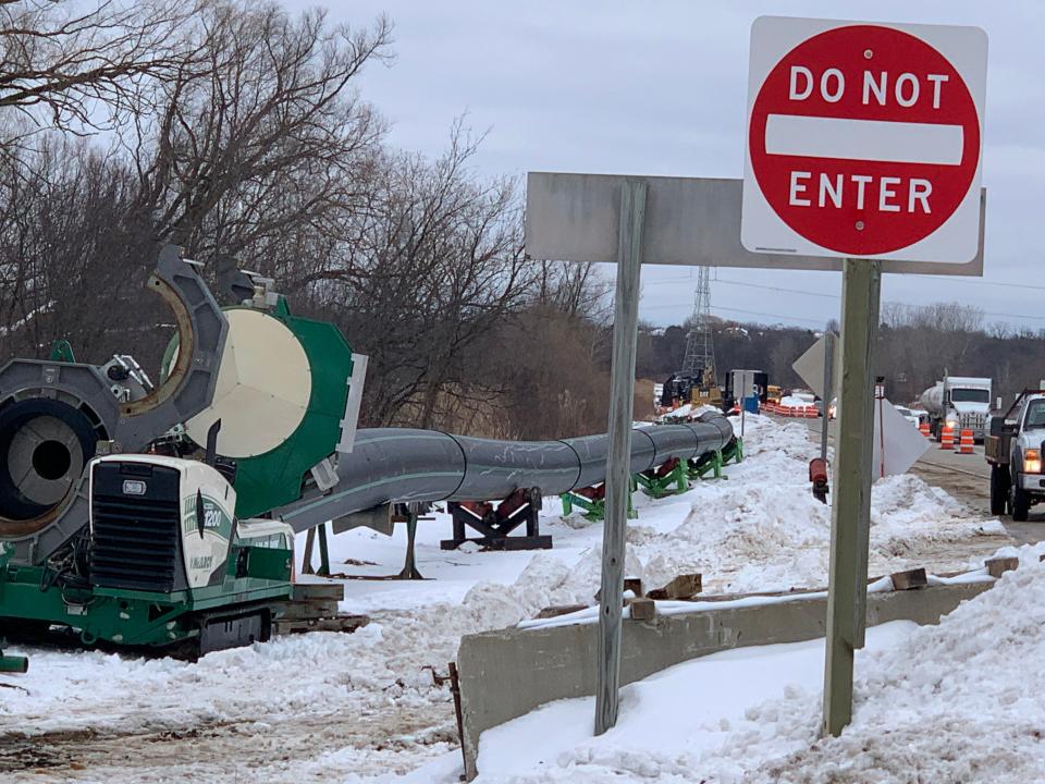 Crews from contractor S.J. Louis Construction work on the installation of a pipeline on Les Paul Parkway just west of East Avenue in February 2021. Such work was repeated over several years in from Milwaukee to Waukesha.