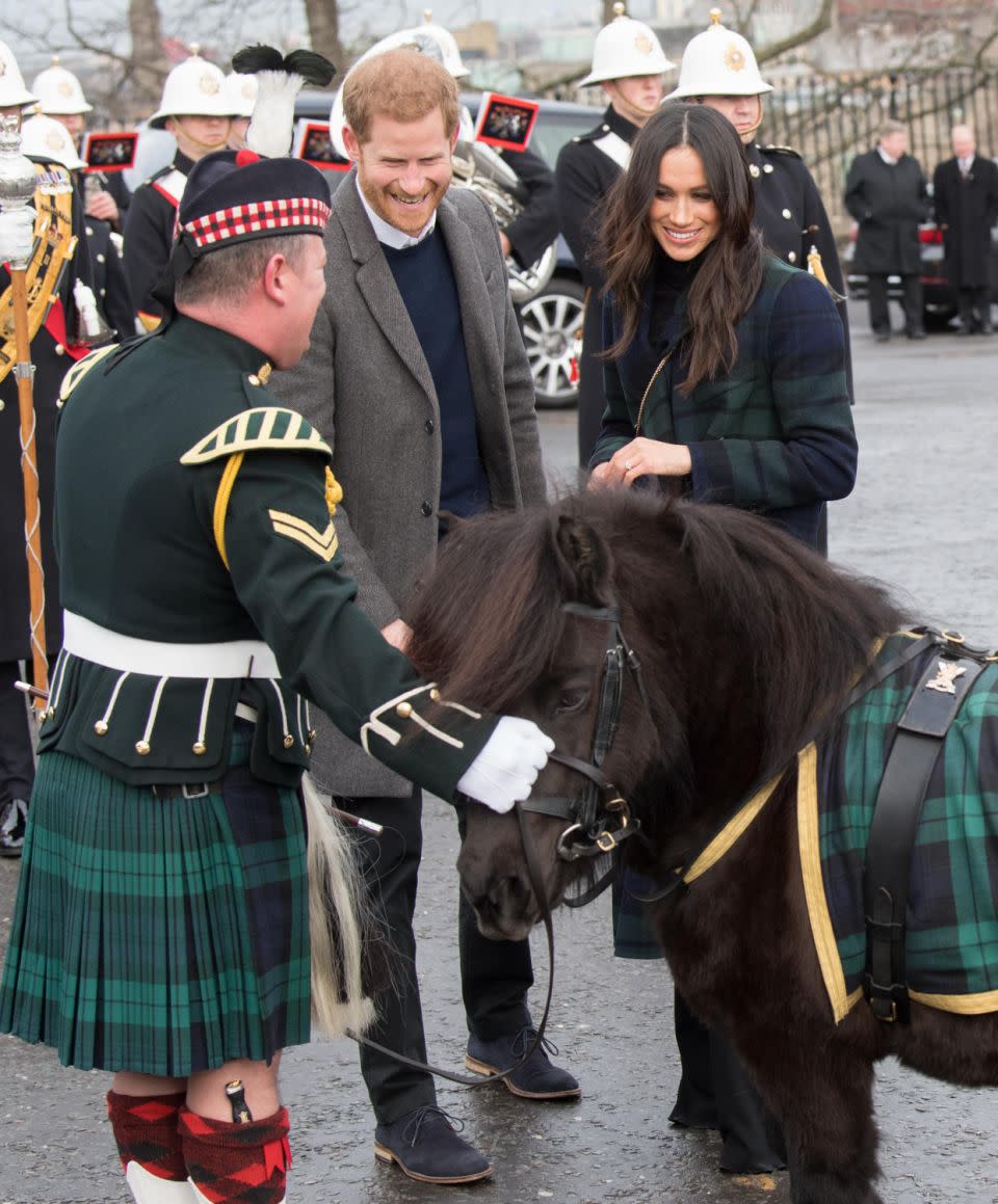 They met with a Shetland pony, who was also wearing a tartan coat. Photo: Getty Images