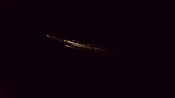 Russian cosmonaut Maxim Suraev captured this amazing picture of Orbital Sciences' Cygnus spacecraft breaking up in the atmosphere to the east of New Zealand on Aug. 17, 2014.