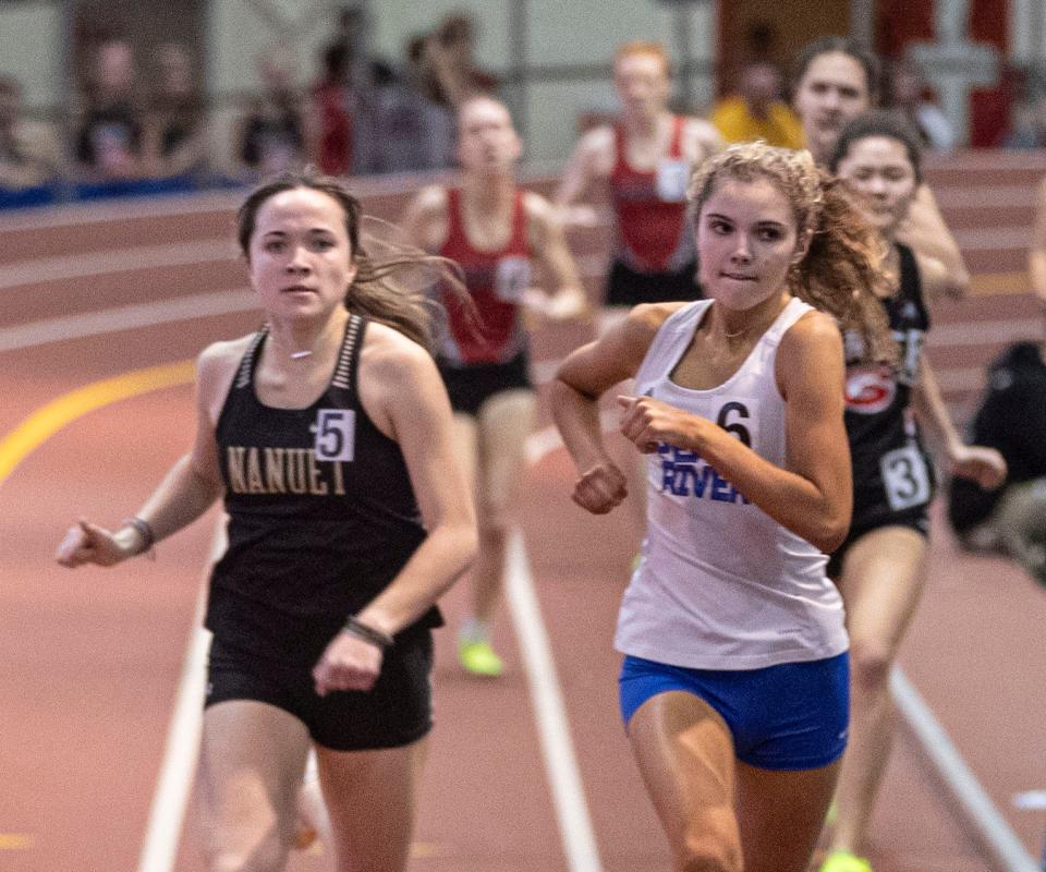 Claire OÕSulivan of Pearl River, right edged Samantha Cow of Nanuet to win the girls 600 meter race at the Section 1 Class B track and field championships at The Armory in Manhattan Feb. 4, 2024.