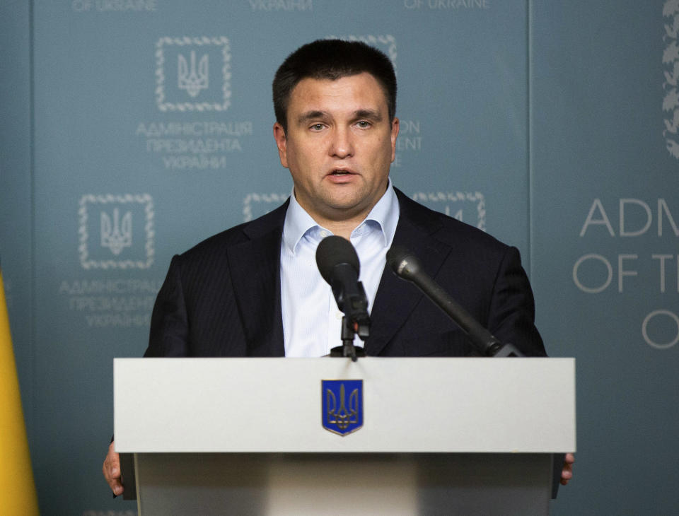 Ukrainian Foreign Affairs Minister Pavlo Klimkin speaks during his statement in Kiev, Ukraine, Sunday, Nov. 25, 2018. Russia's coast guard opened fire on and seized three of Ukraine's vessels Sunday, wounding two crew members, after a tense standoff in the Black Sea near the Crimean Peninsula, the Ukrainian navy said. (Mykhailo Markiv, Presidential Press Service via AP, Pool)