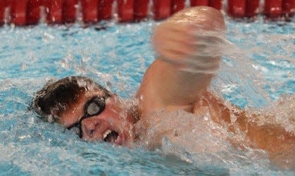 BNL junior Trey Kimbley thrashes to victory in the 200 freestyle against Edgewood.