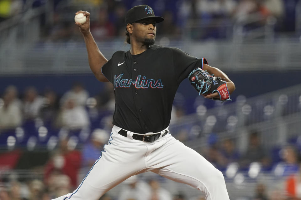 Miami Marlins starting pitcher Edward Cabrera aims a pitch during the first inning of the team's baseball game against the New York Mets, Friday, Sept. 9, 2022, in Miami. (AP Photo/Marta Lavandier)