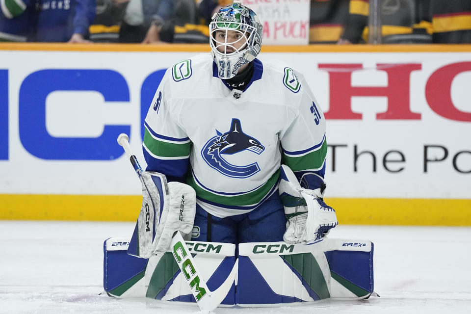 Vancouver Canucks goaltender Arturs Silovs (31) warms up before the start of Game 4 against the Nashville Predators in an NHL hockey Stanley Cup first-round playoff series Sunday, April 28, 2024, in Nashville, Tenn. (AP Photo/George Walker IV)