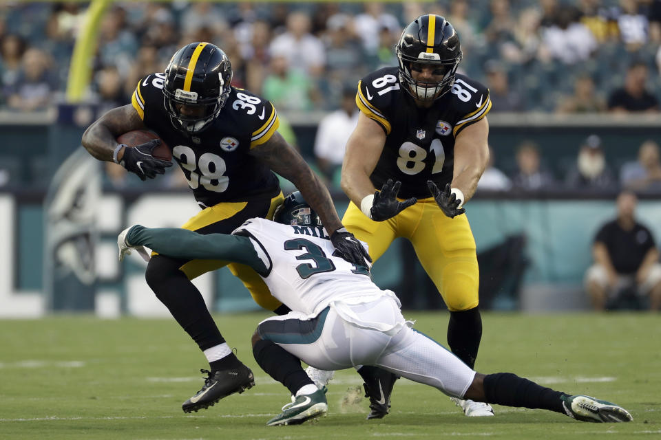 Pittsburgh Steelers' Jaylen Samuels (38) is tackled by Philadelphia Eagles' Jalen Mills (31) during the first half of a preseason NFL football game Thursday, Aug. 9, 2018, in Philadelphia. (AP Photo/Michael Perez)