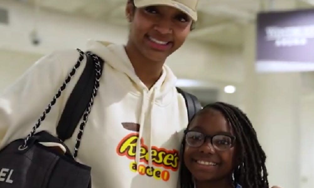 Chicago Sky forward Angel Reese meeting a young fan named Angel.