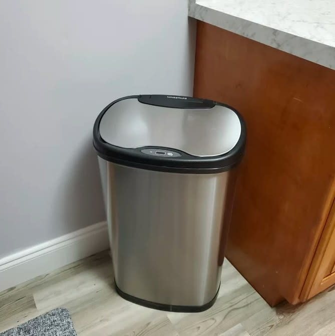 The trash can in a kitchen
