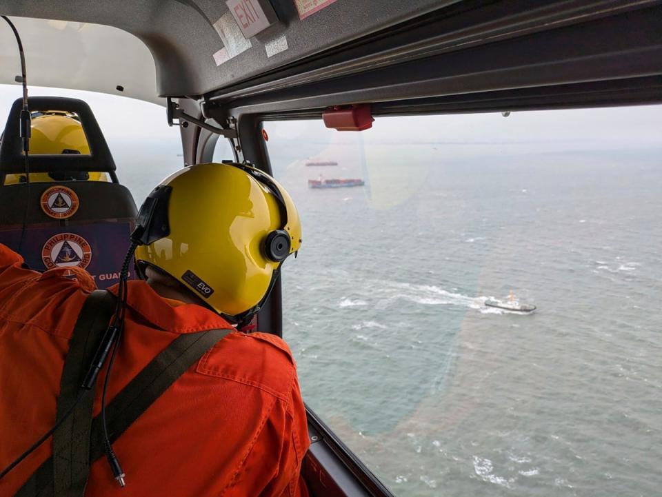 An aerial survey is conducted by Coast Guard Aviation Command as part of the oil spill response operation in Manila Bay, Philippines (Philippine Coast Guard)