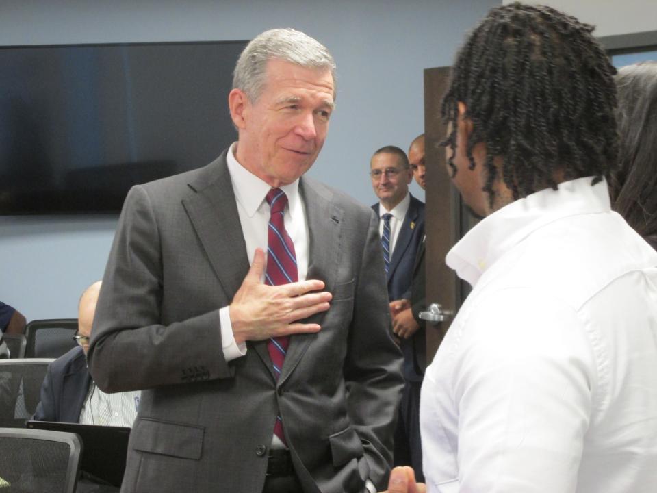 Gov. Roy Cooper visits with Fayetteville veterans Wednesday, Nov. 8, 2023, at the NCWorks Career Center in Fayetteville.