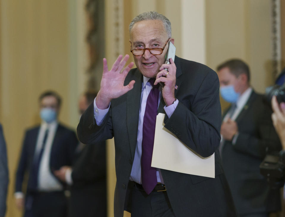 Senate Majority Leader Chuck Schumer, D-N.Y., pauses for a vote before speaking to reporters as work continues on the Democrats' Build Back Better Act, massive legislation that is a cornerstone of President Joe Biden's domestic agenda, at the Capitol in Washington, Tuesday, Sept. 14, 2021. (AP Photo/J. Scott Applewhite)