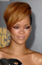 With “Rude Boy” flooding the airwaves, Rihanna went blonde and rocked some daring magenta eyeliner.