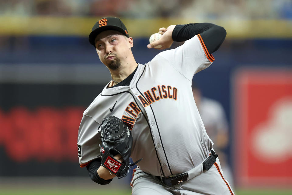 San Francisco Giants starting pitcher Blake Snell throws against the Tampa Bay Rays during the first inning of a baseball game Sunday, April 14, 2024, in St. Petersburg, Fla. (AP Photo/Mike Carlson)