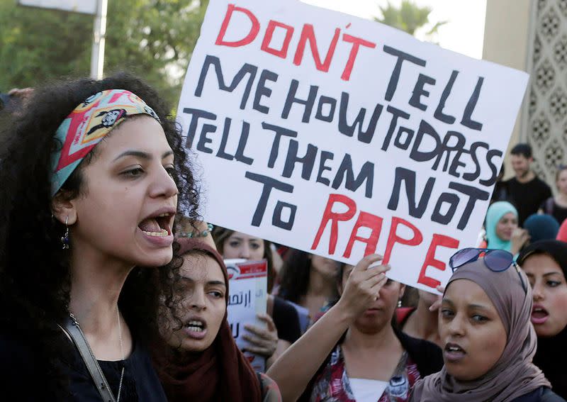 FILE PHOTO: Women chant slogans as they gather to protest against sexual harassment in front of the opera house in Cairo