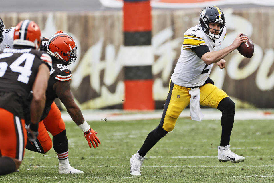 Pittsburgh Steelers quarterback Mason Rudolph (2) scrambles during the first half of an NFL football game against the Cleveland Browns, Sunday, Jan. 3, 2021, in Cleveland. (AP Photo/Ron Schwane)