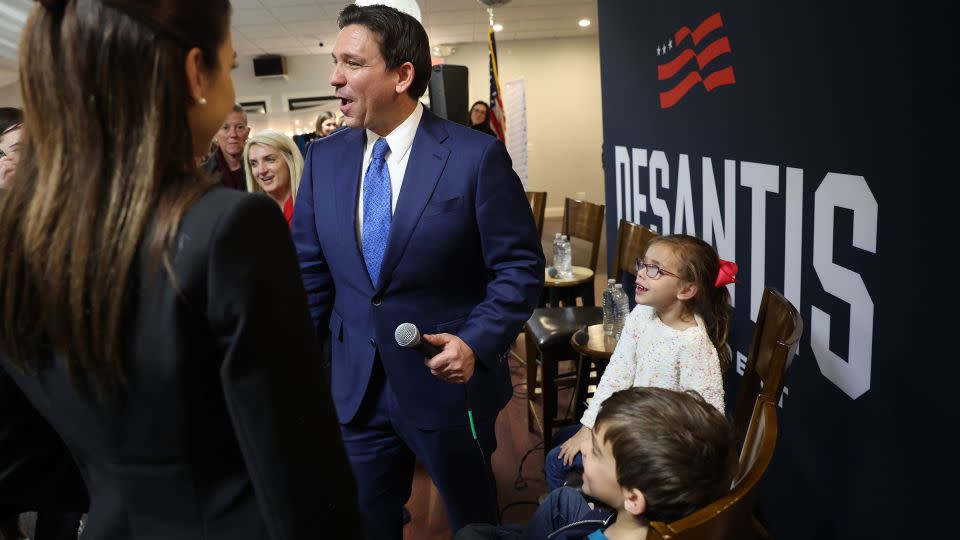 Florida Gov. Ron DeSantis and his family greet guests after speaking at an event in Bettendorf, Iowa, on December 18, 2023. - Scott Olson/Getty Images