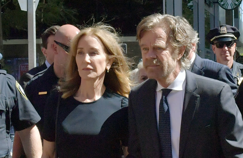 Felicity Huffman and William H Macy outside court during the college admission scandal trial credit:Bang Showbiz