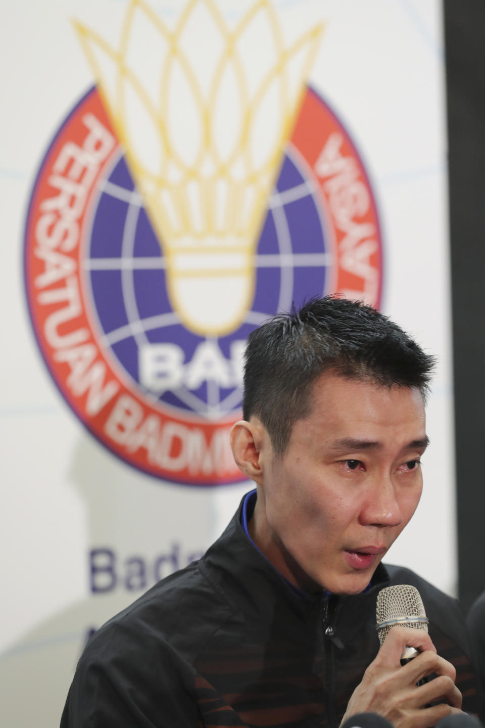 Malaysian badminton player Lee Chong Wei speaks during a press conference in Putrajaya, Malaysia, Thursday, June 13, 2019. Former World No. 1-ranked Lee has announced his retirement from badminton after 19 years following his battle with cancer. (AP Photo/Vincent Thian)