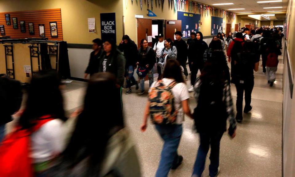 Congestion in a main hallway as students change classrooms at Chiawana High School in Pasco.