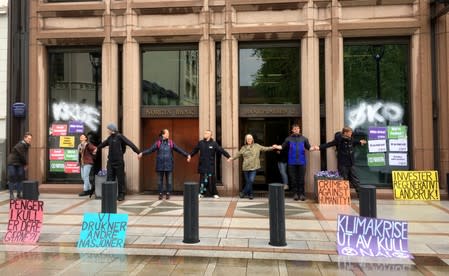 FILE PHOTO: Extinction Rebellion climate activists block central bank entrance in Oslo