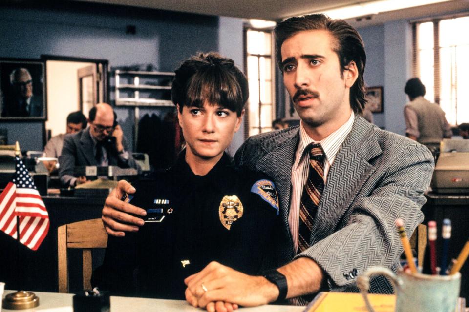 RAISING ARIZONA, from left: Holly Hunter, Nicolas Cage, 1987