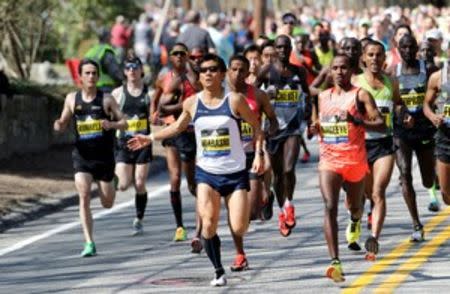 Apr 18, 2016; Boston, MA, USA; Elite runners make their way along the course during the 2016 Boston Marathon. Mandatory Credit: David Butler II-USA TODAY Sports