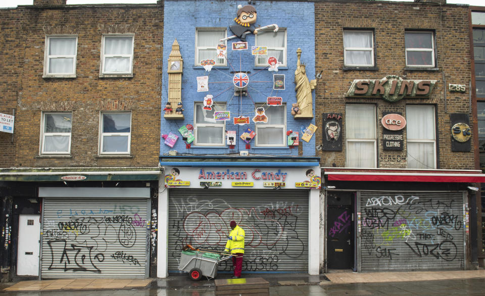 Shuttered shops on Camden high street in London. Photo: Dominic Lipinski/PA via AP