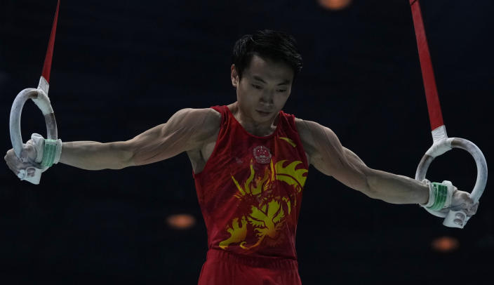 China's Zou Jingyuan competes in the rings finals in the rings finals during the Artistic Gymnastics World Championships at M&S Bank Arena in Liverpool, England, Saturday, Nov. 5, 2022. (AP Photo/Thanassis Stavrakis)