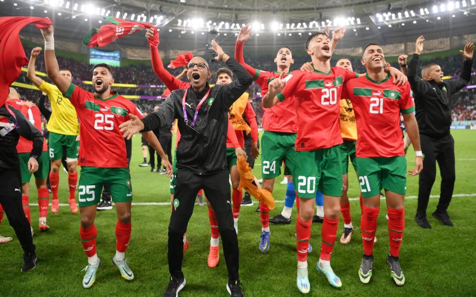 Morocco players celebrate a historic moment for their country - GETTY IMAGES