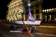 Climate change activists take part in a demonstration called "Rise up for change" in Bern