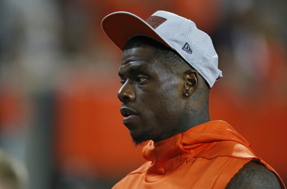 Cleveland Browns wide receiver Josh Gordon watches from the sideline during the first half of the team's NFL preseason football game against the Philadelphia Eagles, Thursday, Aug. 23, 2018, in Cleveland. (AP Photo/Ron Schwane)