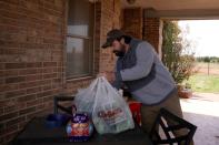 Chlebanowski delivers fresh produce to a customers home in Norman