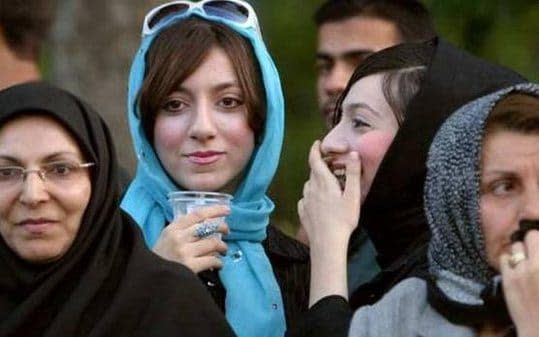 Women in the Iranian capital will no longer be arrested for failing to wear a headscarf - Reuters