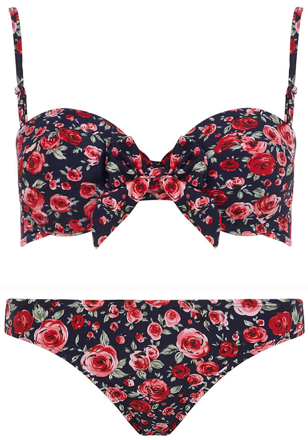 Navy Floral Bow Balconette Bikini Top (£14.00) and Bottoms (£9.00) – <a href="http://www.dorothyperkins.com/webapp/wcs/stores/servlet/TopCategoriesDisplay?storeId=12552&catalogId=33053" rel="nofollow noopener" target="_blank" data-ylk="slk:Dorothy Perkins;elm:context_link;itc:0;sec:content-canvas" class="link ">Dorothy Perkins</a><br><br>This <a href="http://uk.lifestyle.yahoo.com/photos/celebrities-floral-fashion-blake-lively-vanessa-hudgens-eva-mendes-slideshow/" data-ylk="slk:floral;elm:context_link;itc:0;sec:content-canvas;outcm:mb_qualified_link;_E:mb_qualified_link;ct:story;" class="link  yahoo-link">floral</a>-print bikini is sure to enhance your cleavage.