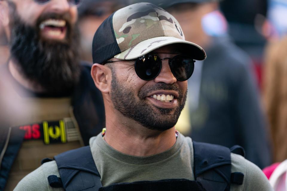 Enrique Tarrio, leader of the Proud Boys, a far-right group, attends a &quot;Stop the Steal&quot; rally against the results of the U.S. presidential election outside the Georgia state Capitol on Nov. 18, 2020, in Atlanta.