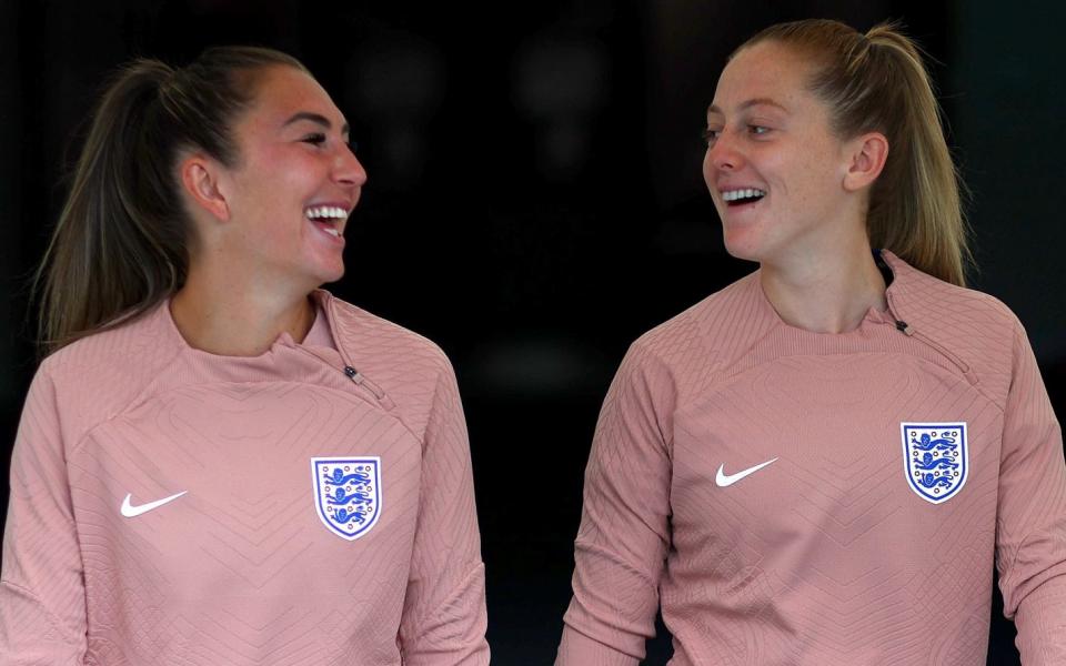 Katie Zelem and Keira Walsh of England walk through the tunnel prior to a training session at Central Coast Stadium