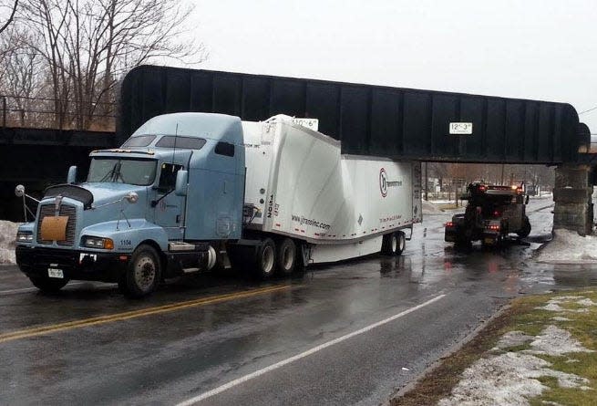 This truck was stuck under the West Ave. bridge in Canandaigua in Feb. 2016, heading West toward Main Street.
