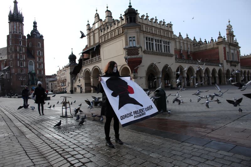 Activists protest against an initiative to tighten abortion rules in Krakow