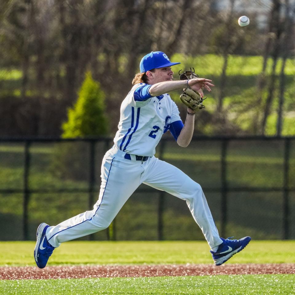 Oak Creek third baseman Ethan Mallonee throws on the run during a game at home against Racine Horlick last Friday. Oak Creek is 7-0 and No. 1 in our rankings this week.