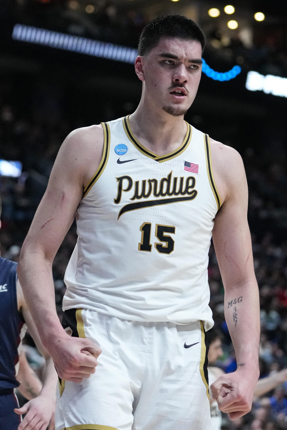 FILE - Purdue center Zach Edey (15) reacts after being fouled by Fairleigh Dickinson in the second half of a first-round college basketball game in the men's NCAA Tournament in Columbus, Ohio, Friday, March 17, 2023. Edey was named to the preseason AP All-America men’s NCAA college basketball team, revealed Monday, Oct. 23, 2023. (AP Photo/Michael Conroy, File)