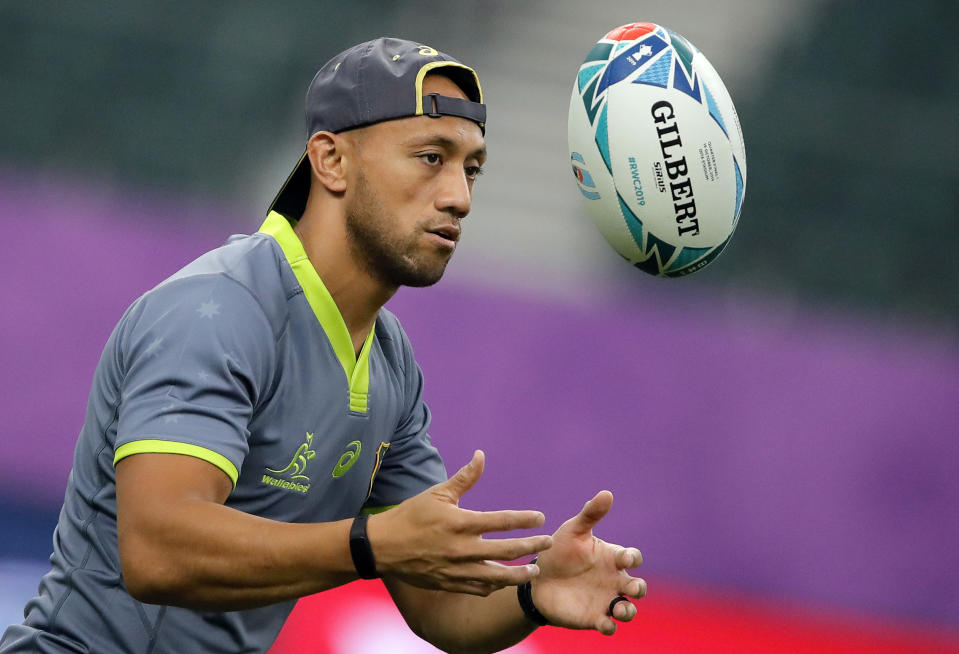 FILE - Australia's Christian Leali'ifano catches the ball during a training session in Oita, Japan, on Oct. 18, 2019. Former Australia international Christian Leali’ifano will start at flyhalf for Samoa when it opens its Rugby World Cup campaign against Chile on Saturday, Sept. 16, 2023. (AP Photo/Christophe Ena, File)