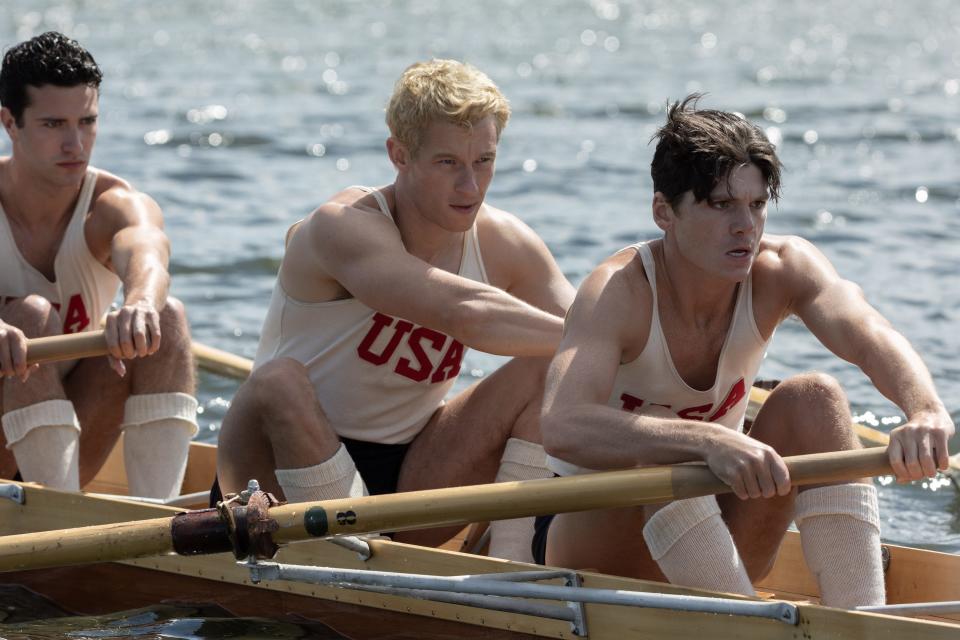 University of Washington rowing teammates Shorty Hunt (Bruce Herbelin-Earle, from left), Joe Rantz (Callum Turner) and Don Hume (Jack Mulhern) take on the world in director George Clooney’s period sports movie "The Boys in the Boat."