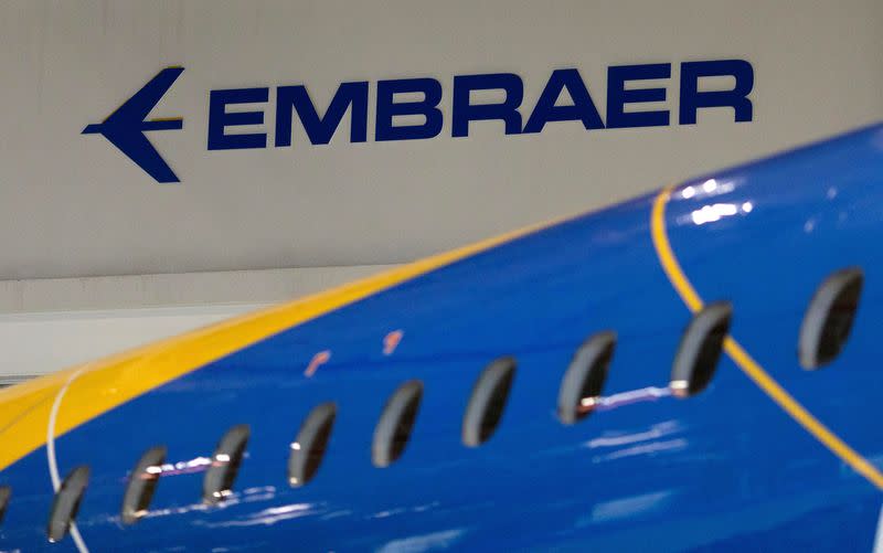 FILE PHOTO: The logo of Brazilian planemaker Embraer SA is seen at the company's headquarters in Sao Jose dos Campos