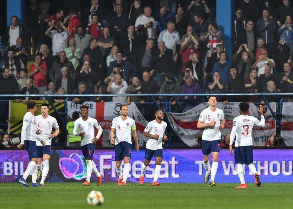 England celebrate an emphatic victory over Montenegro