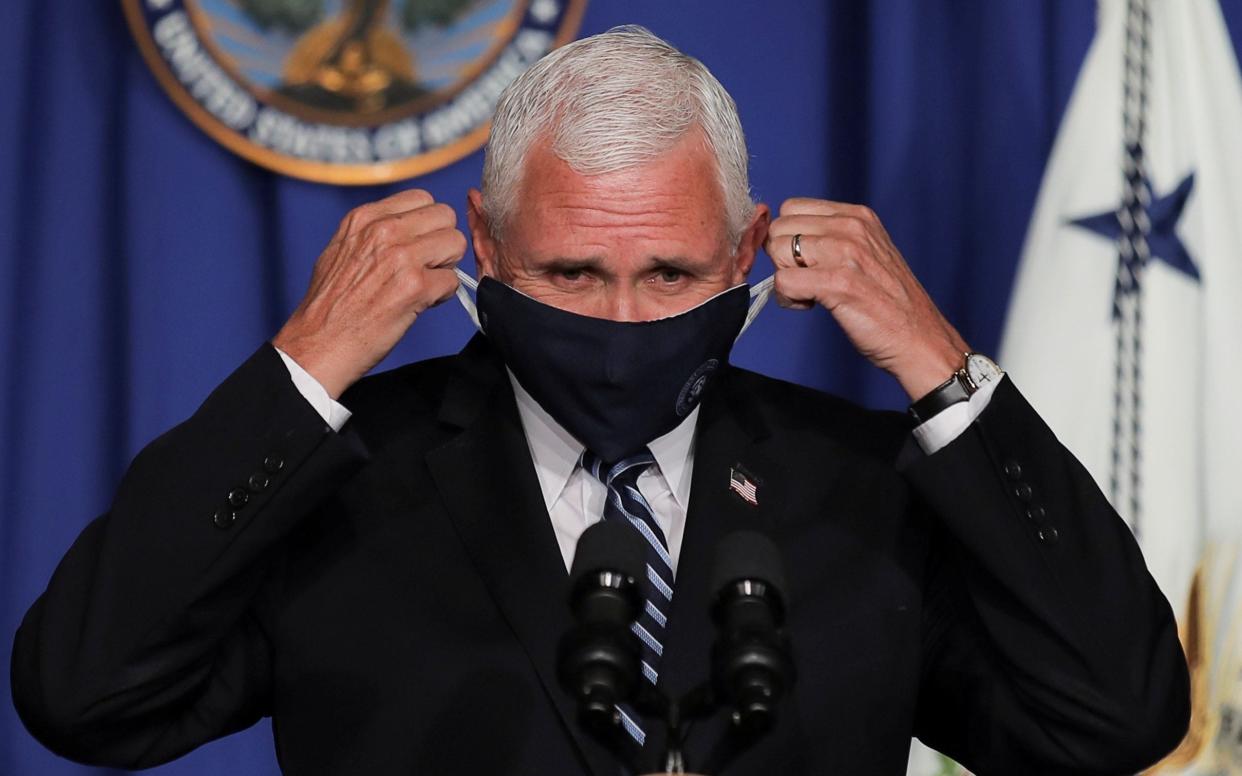 Mike Pence, the US Vice President, set the White House on a collusion course with state governors when he called for schools to reopen in a briefing on Wednesday afternoon - CARLOS BARRIA/REUTERS