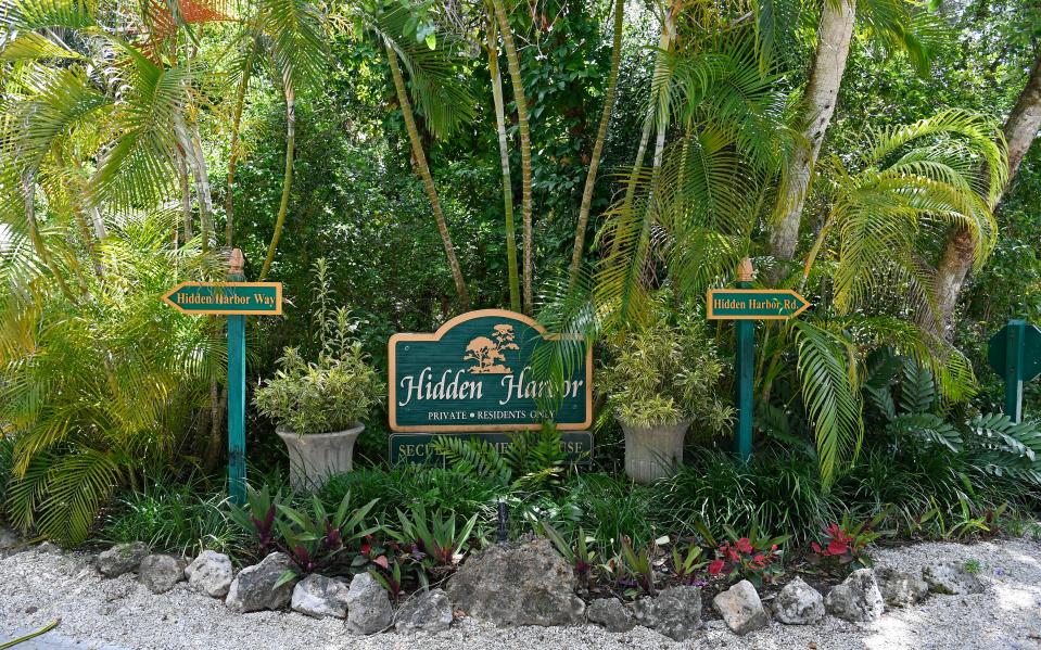 Siesta Key’s Hidden Harbor, built in the mid-1950s, incorporates a greenbelt of trees and shrubs that provide a buffer between the community and traffic on Midnight Pass Road.