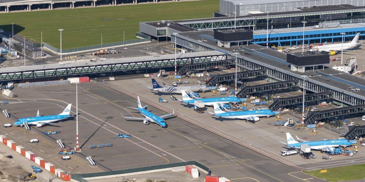 This aerial view taken on October 29, 2021, shows parked plane on the tarmac at Schiphol airport, near Amsterdam. - - Netherlands OUT (Photo by ARTHUR VAN DER KOOIJ / ANP / AFP) / Netherlands OUT (Photo by ARTHUR VAN DER KOOIJ/ANP/AFP via Getty Images)